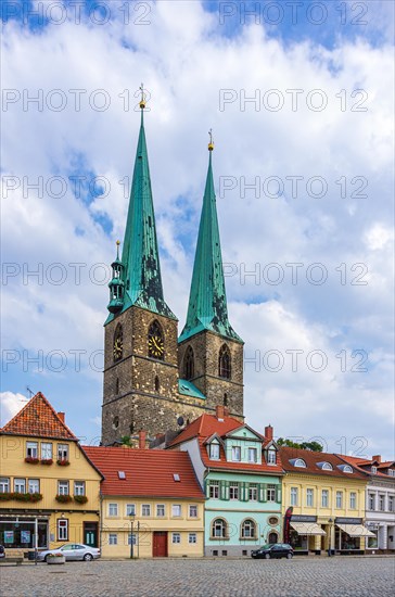 Street view of Poelkenstrasse with a view of the parish church of St. Nikolai in the historic Neustadt in the UNESCO World Heritage town