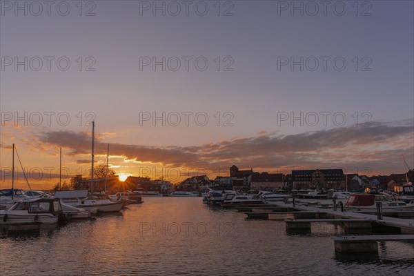 City harbour of the small town Waren in the evening light