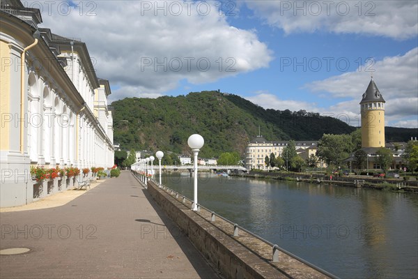 Baroque UNESCO Casino on the Lahn riverbank promenade with Quellenturm and Concordiaturm on the hill