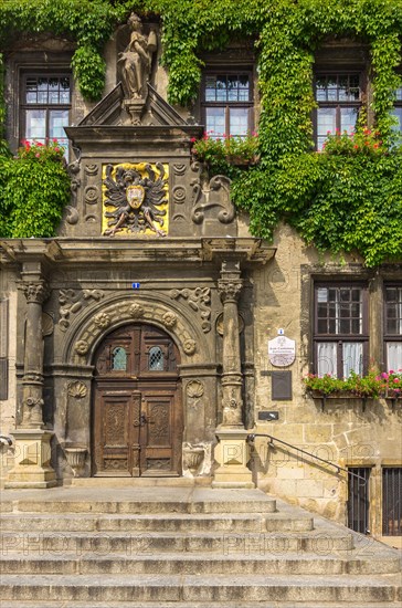 Main portal of the Gothic town hall from the beginning of the 14th century on the market square in the historic old town of the World Heritage city