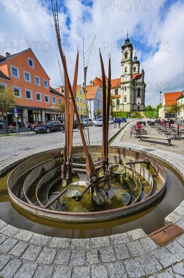 Market square with basilica and kinetic artwork