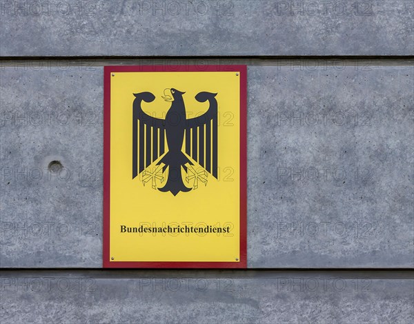 Sign with federal eagle on the building of the Federal Intelligence Service BND