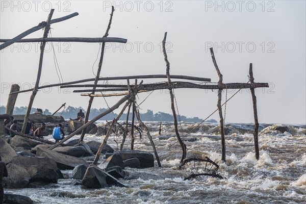 Wooden tripods with baskets attached