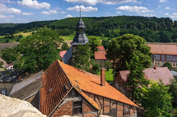 View from the west tower of the Romanesque monastery ruins of St. Wigbert on surrounding structures of the village of Goellingen near Bad Frankenhausen in Kyffhaeuserland