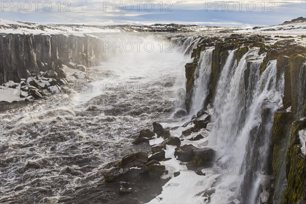 Selfoss waterfall on the river Joekulsa a Fjoellum in in the Joekulsargljufur canyon in winter