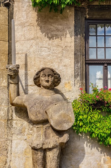 The famous Roland on the south-west corner of the medieval town hall on the historic market square of Quedlinburg