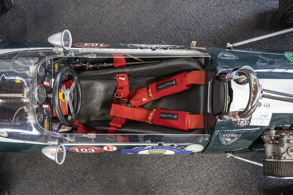 Top view of a retro racing car with bucket seat