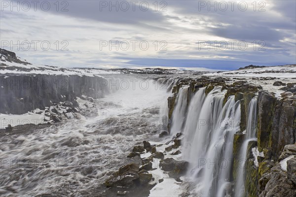 Selfoss waterfall on the river Joekulsa a Fjoellum in in the Joekulsargljufur canyon in winter