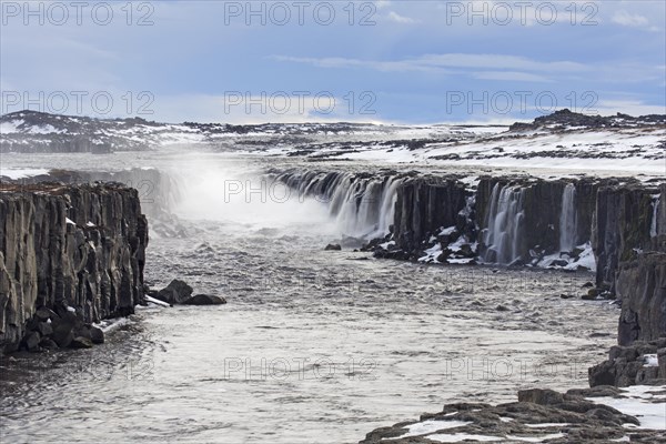 Selfoss waterfall on the river Joekulsa a Fjoellum in in the Joekulsargljufur canyon in winter