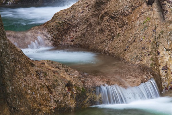 Waterfall in the river Almbach running through the Almbachklamm canyon in the Berchtesgaden Alps