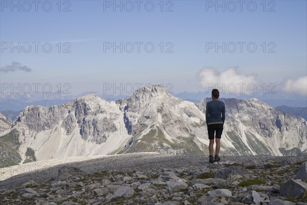 Woman on the summit of the Weisseck