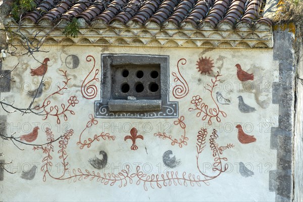 Champeix. Rural fresco on a shed wall. Puy de Dome department. Auuvergen Rhone Alpes. France