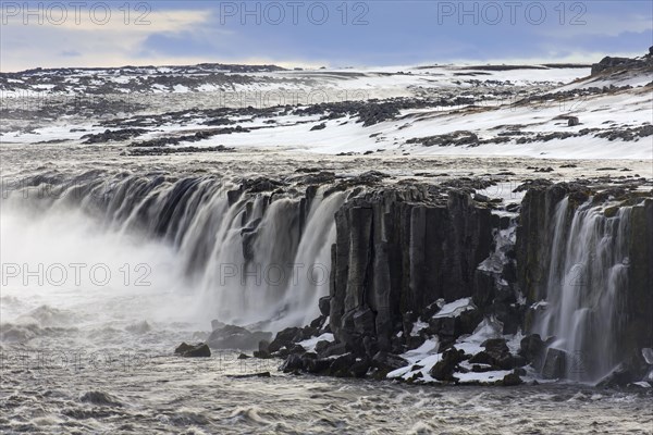 Selfoss waterfall on the river Joekulsa a Fjoellum in in the Joekulsargljufur canyon in winter