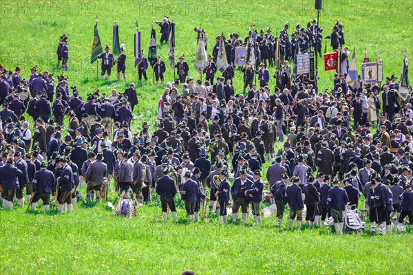 Mountain riflemen gather at the patron saint's day in a meadow near Gmund am Tegernsee