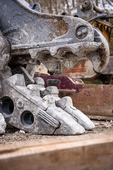 Excavator grab on demolition site