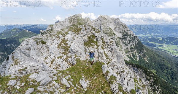 Mountaineer on a ridge trail