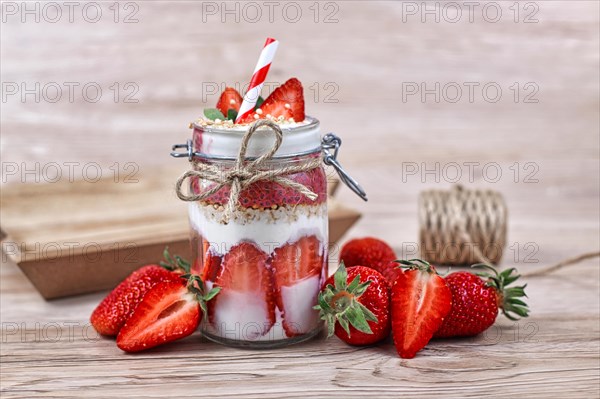 Strawberry fruit dessert with low fat yogurt
