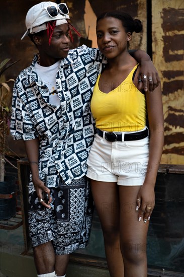 Young African American young couple enjoying a walk in the city. Urban concept