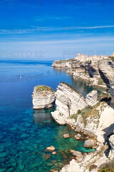 Steep coast of Bonifacio with old town on a limestone plateau