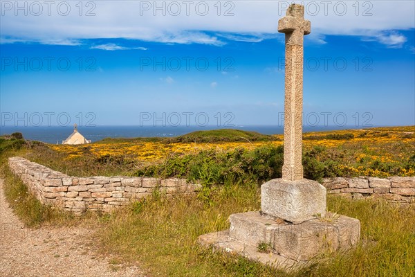 Stone cross at the Saint-They chapel at Pointe du Van