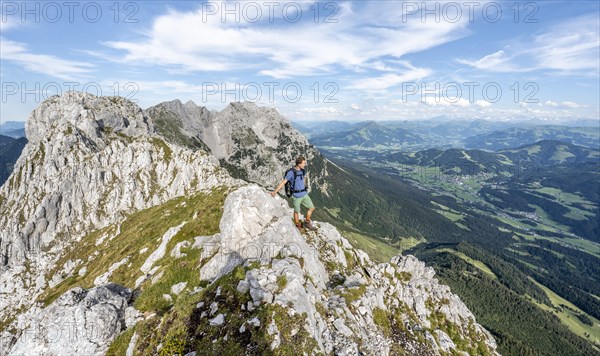 Mountaineer on a ridge path