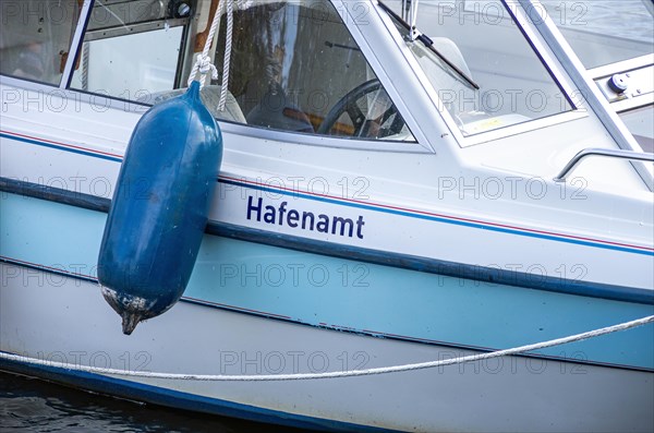 Boat detail with the inscription HAFENAMT in the city harbour of Greifswald-Wieck