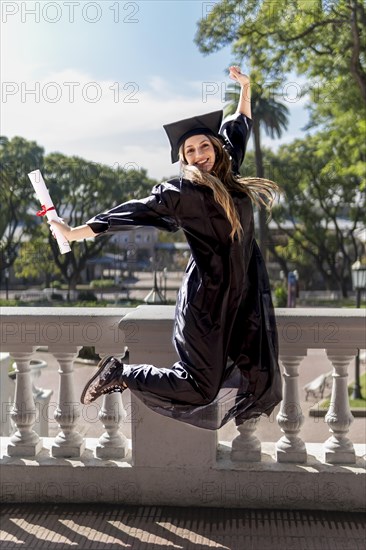 Young girl recently graduated