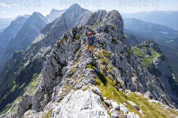 Climbers at the summit of the Upper Wettersteinspitze