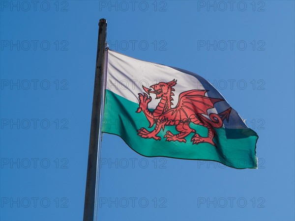 Welsh Flag of Wales over blue sky