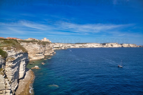 Steep coast of Bonifacio with old town on a limestone plateau