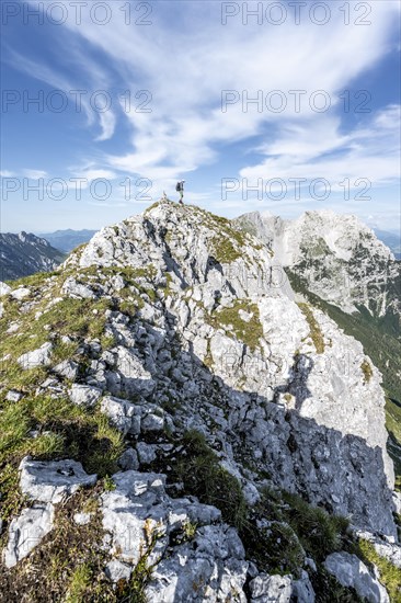 Mountaineer on a ridge path