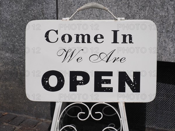 Come in we are open sign