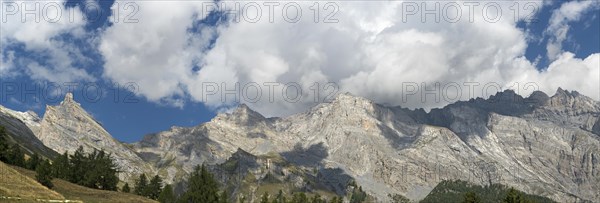 Steep southern flank of the limestone mountain range of the Haut de Cry peak