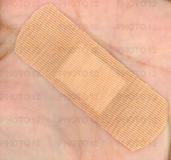 Band aid bandage on hand