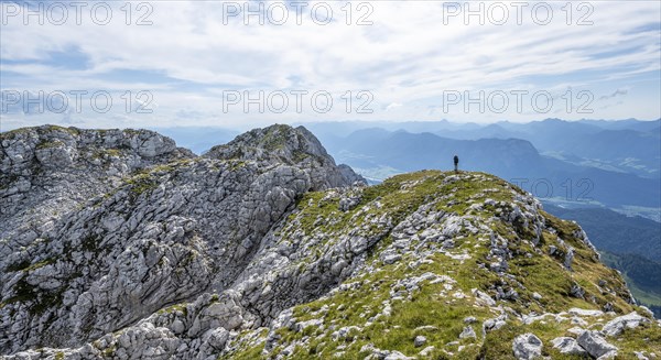 Mountaineer on a ridge path