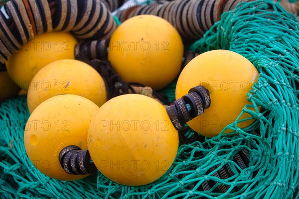 Fishing nets and buoys in the harbour of Guilvinec