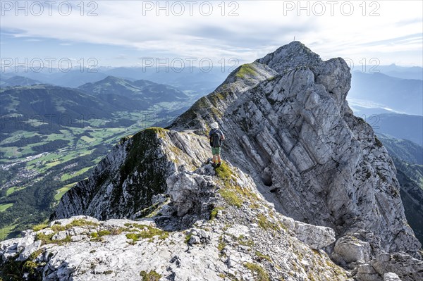 Mountaineer on a ridge path