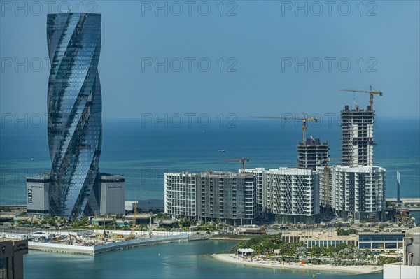 Overlook over the high rise buildings and the United tower in the Kingdom of Bahrain