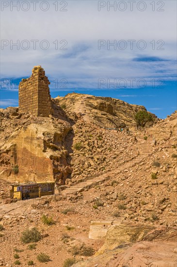 Obelisk in the rock vegetation