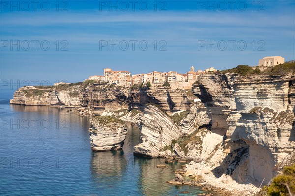 Steep coast of Bonifacio with old town on a limestone plateau