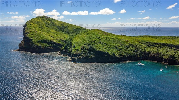 Aerial view of bird's eye view on western part of Isle de Coin de Mire Gunner's Coin Island off north coast of Mauritius in Indian Ocean