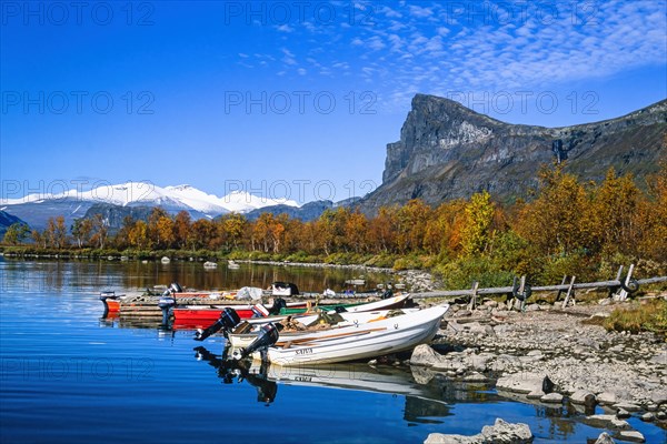 Boats at the beach at Lake Laitaure in Aktse at Sarek national park in Sweden