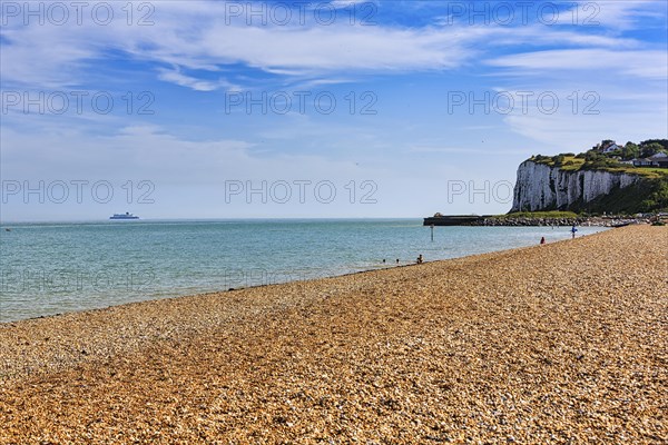 Shingle beach with chalk cliffs