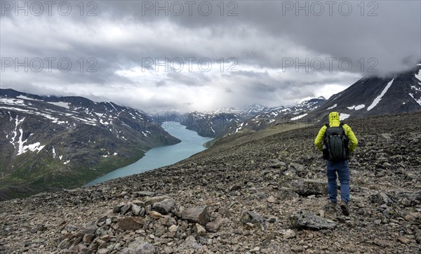 Climbers on stony trail