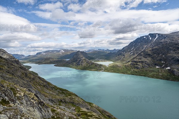 View of Lake Gjende behind Knutshoe Mountain withLake Ovre Leirungen