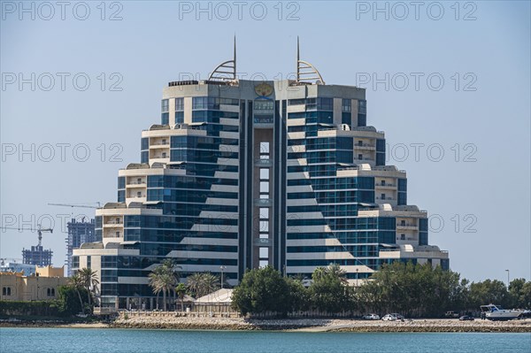 Overlook over the high rise buildings and the United tower in the Kingdom of Bahrain