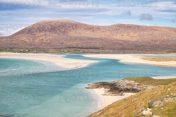 Coastline with sandy beach and mountains