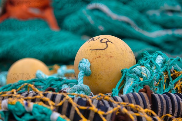 Fishing nets and buoys in the harbour of Guilvinec