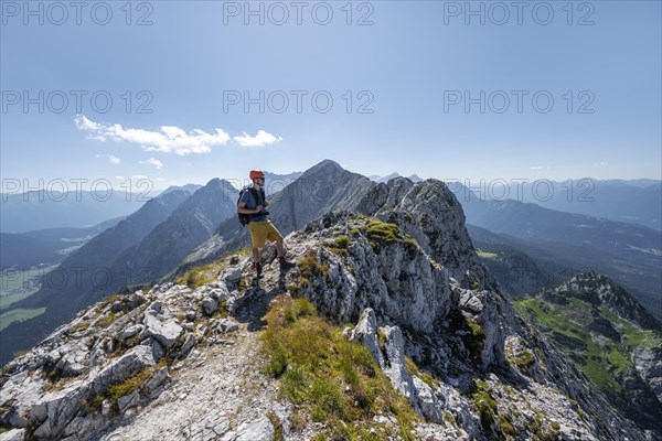 Climbers at the summit of the Upper Wettersteinspitze