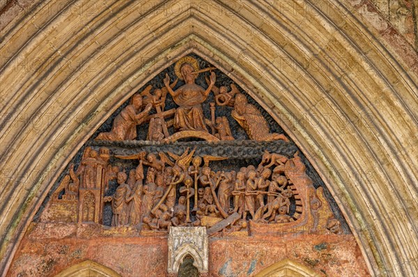 Tympanum of the court portal with a late Gothic depiction of the Last Judgement